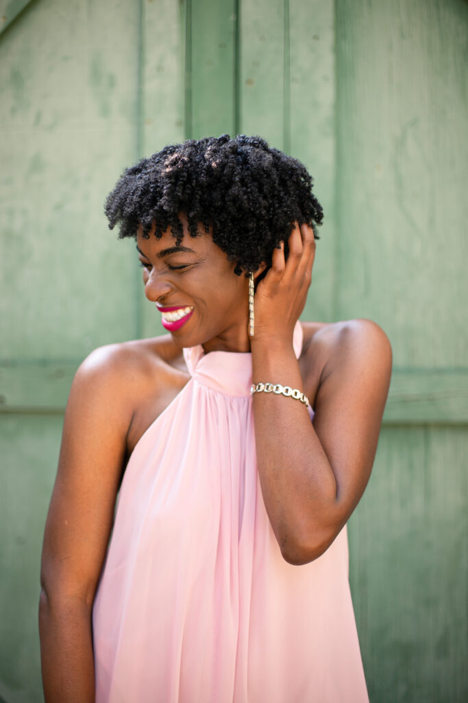 Black Woman in pastel dress